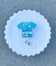 Load image into Gallery viewer, Scrub Top Badge Reel