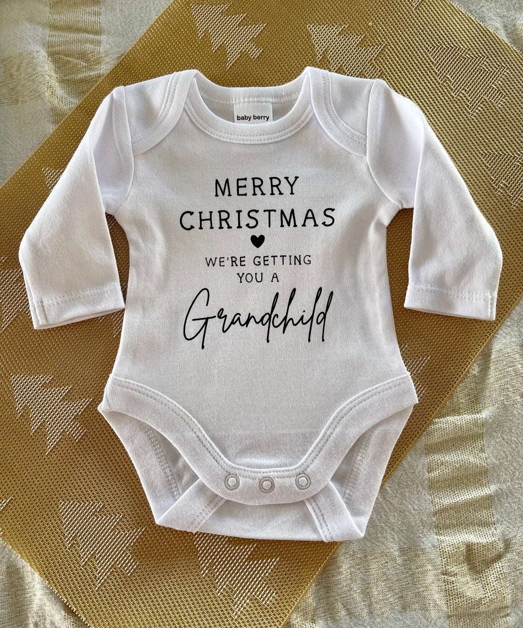 We're getting you a Grandchild Christmas baby onesie