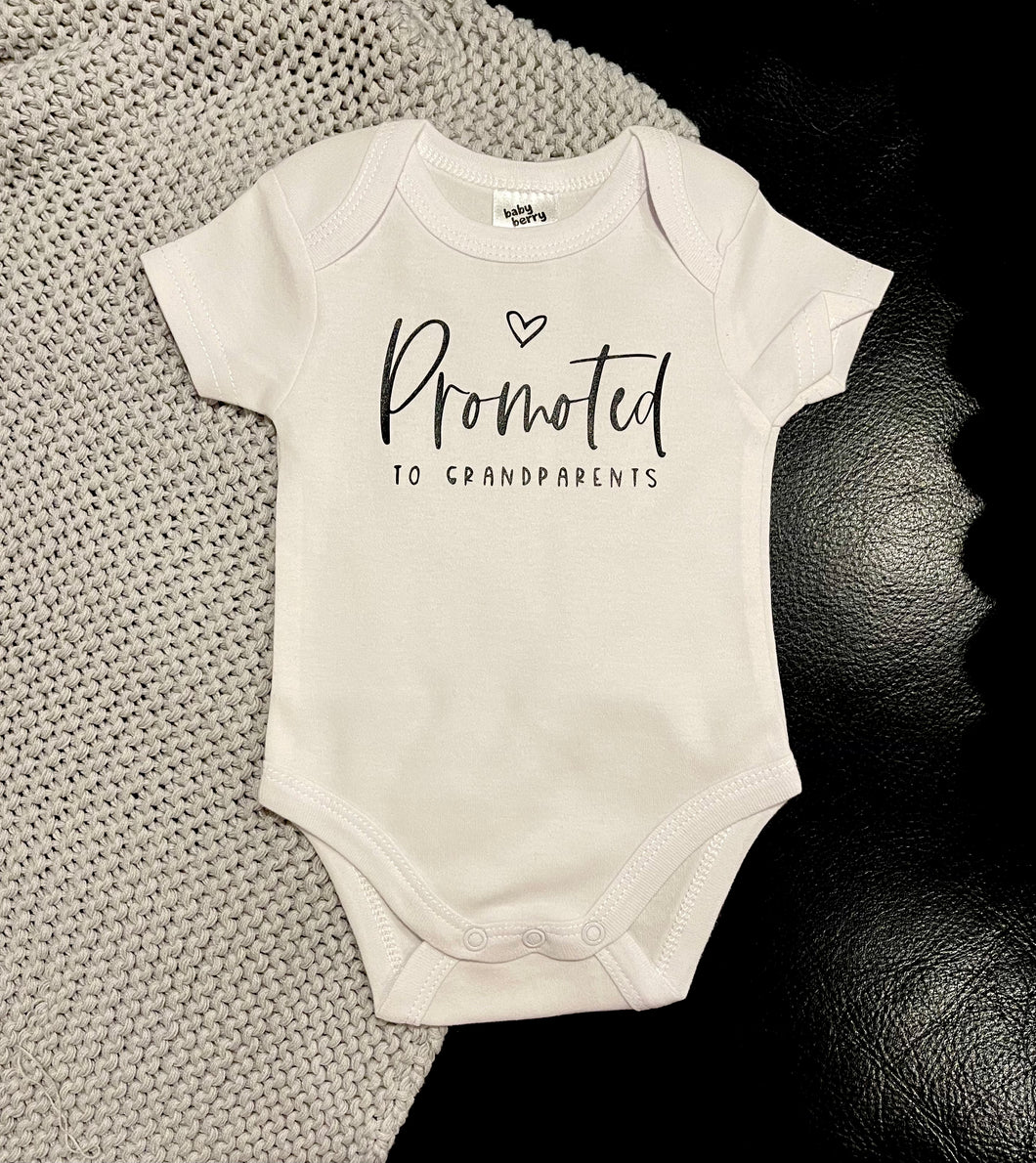 Promoted to grandparents baby onesie